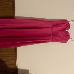 From Dillards originally $120. Pink strapless prom dress with pockets.